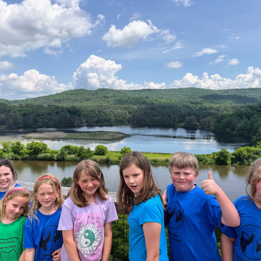 Students overlook a lake.